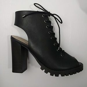 Lace up heeled, peep-tie combat boots…